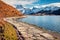 Nice autumn scene of Bachsee lake with Wetterhorn and Wellhorn peaks on background. Colorful morning in Bernese Oberland Alps, Gri