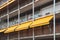 Nice balcony with yellow awning in apartment house