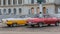 Nice beautiful classic retro vintage taxi cars waiting for their clients near the capitol Cuban Havana city