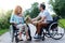 Nice beautiful wheelchaired woman getting a bunch of flowers