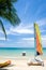 Nice boats on beach with nice sand and clear blue sky with white clouds and coconut tree