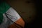 Nice dark image of Ireland flag with big folds on dark wood with free place for text - any holiday flag 3d illustration
