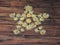 Nice decoration on a wooden door -  pentagonal star of  dried silver thistles