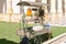 Nice drink cart with lemonade and orangeade decorating a garden