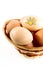 Nice eggs with sun sign in basket