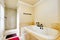 Nice empty bathroom with large white tub and shower.