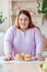 Nice excited woman looking at the burgers