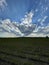 nice field with sky and clouds in czech