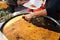 Nice, France, 25th of February 2020: Farinata or Cecina or Torta di ceci thin unleavened pancake