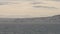 NICE, FRANCE - MARCH 8, 2023: Slow motion panoramic shot of Nice coast from a sea