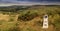 Nice green landscape with a signpost in the front