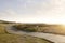 nice green shore and path during sunset