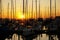 Nice harbor view with sailing boats and sunrise in the spring.