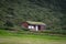 Nice Icelandic house with turf roof and green grass