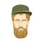 Nice-looking man with a beard and mustache wearing green cap on a white background. Lumberjack stares at you. Head image