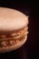 Nice macaroon on black background