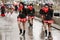 Nice majorettes under rain at Carnival parade, Stuttgart