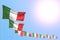 Nice many Italy flags placed diagonal on blue sky with space for text - any celebration flag 3d illustration