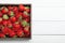 Nice organic red strawberry fruit. Nature farm background. Copy space for text