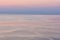 Nice pink sunset seascape in pastel shades, peace and calm outdoor travel background, motion blur