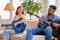 nice pleasant female sitting comfy sofa playing guitar learning spend time with man