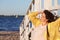 Nice plus size woman on wooden structure on beach