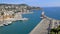 Nice port with white yachts and boats, breathtaking panorama of seaside city