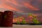 Nice pumpjack oil extraction and cloudy sky in sunset with the CHINA flag on oil barrels 3D rendering