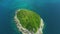 Nice rocks forested island, aerial panorama of Ko Pu against mountainous Phuket landscape on background. Deep tropical jungle