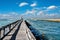 Nice shot on the Capbreton pier and its lighthouse with a fishing boat returning to port