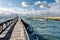 Nice shot on the Capbreton pier and its lighthouse with a fishing boat returning to port