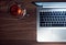 nice silver laptop on wooden desk top