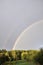 Nice skyscape. Rainy sky with rainbow