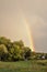 Nice skyscape. Rainy sky with rainbow