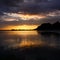 Nice sunset view at guiones beach,Nosara in guanacaste, Costa Rica. Oranje reflects in the sand