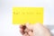 Nice to meet you handwrite with a hand on a yellow paper