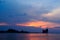 Nice twilight sky with island and dock silhouette