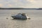 Nice view of Baltic Sea with a parked boat. Beautiful summer nature backgrounds.