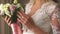 Nice wedding bouquet in bride`s hand