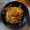 Nicely served japanise style meal yakisoba with vegetables