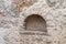 Niche in the wall of an old mikvah in old city of Jerusalem, Israel