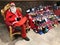 Nicholas waiting with sweets in shoes for children on Saint Nicholas Day