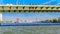 The Nieuwe Maas river with the red cable stayed Willems Bridge in the background viewed from under the Erasmus Bridge in Rotterdam