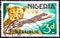 NIGERIA - CIRCA 1965: A stamp printed in Nigeria shows a Cheetah Acinonyx jubatus, circa 1965.