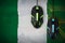 Nigeria flag and two mice with backlight. Online cooperative games. Cyber sport team