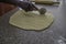 Nigerian African american woman cutting dough to make Nigerian chin chin