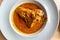 Nigerian Food: Delicious Banga soup  on white plate