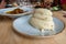 Nigerian Food: Delicious Pounded Yam with Banga Soup in background for dining concept