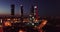 Night aerial view of modern Madrid cityscape with tallest skyscrapers of Four Towers Business Area, Spain