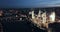 Night aerial view of Zaragoza with Cathedral-Basilica of Our Lady of Pillar on bank of Ebro river, Spain